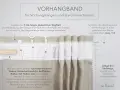 Nahaufnahme eines Gardinenbandes mit Haken und Schnüren zur Aufhängung von Vorhängen.