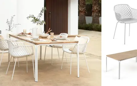 Welcher Stuhl passt zu welchem Tisch? Ein weißer Rattanstuhl mit Armlehnen und ein rechteckiger Holztisch mit Metallgestell.