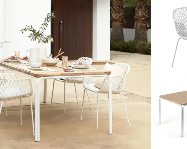 Welcher Stuhl passt zu welchem Tisch? Ein weißer Rattanstuhl mit Armlehnen und ein rechteckiger Holztisch mit Metallgestell.