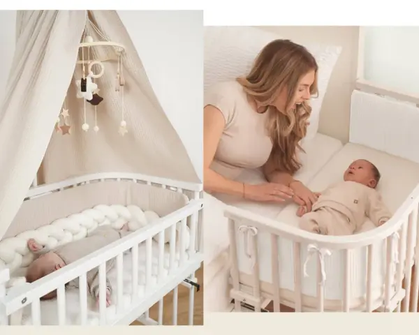 Ein Babybett neben dem Elternbett. Ein süßer Säugling schläft friedlich, während eine Mutter ihr Neugeborenes im Arm hält.