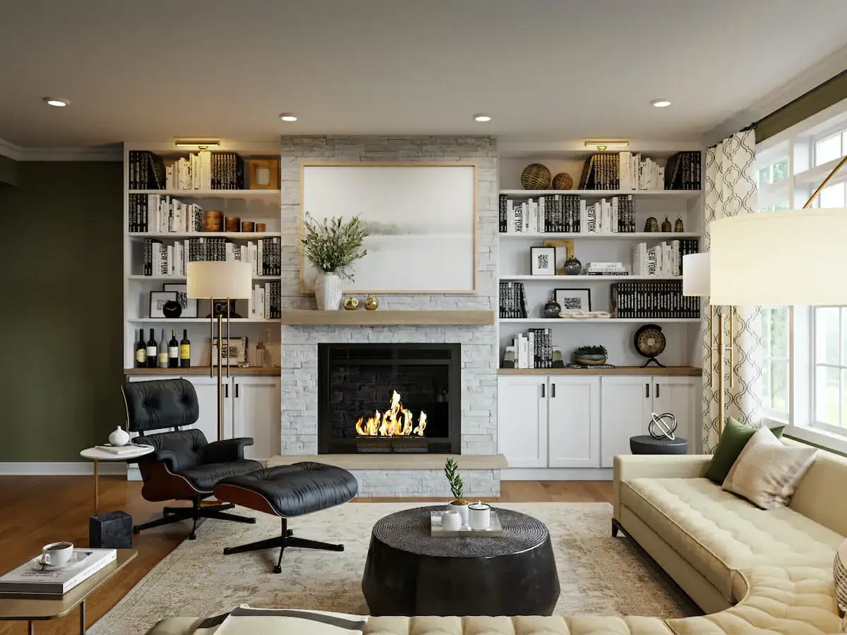 Gemütliches Wohnzimmer mit Kamin, Ledersessel und Sofa. Bücherregale laden dazu ein, das Ambiente regal einrichten zu lassen.